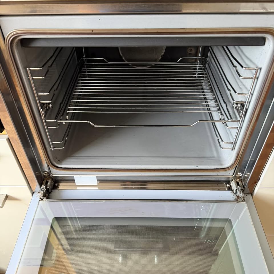 After: a stainless steel oven interior brought back clean, glass door included